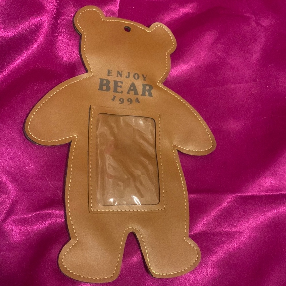 Enjoy bear bag tag with picture slot secret zip compartment in the back.…